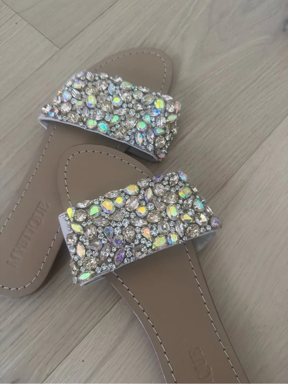 Bejeweled Nude Slide Sandals with Iridescent Stones